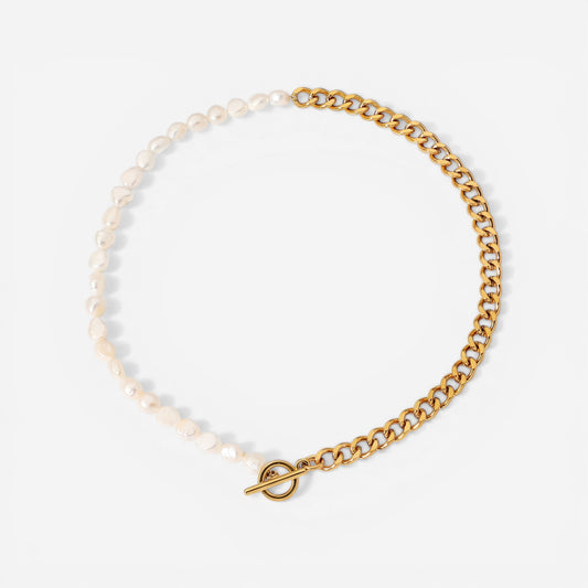 Asymmetrical pearl and gold curb chain necklace with front toggle clasp waterproof jewelry.