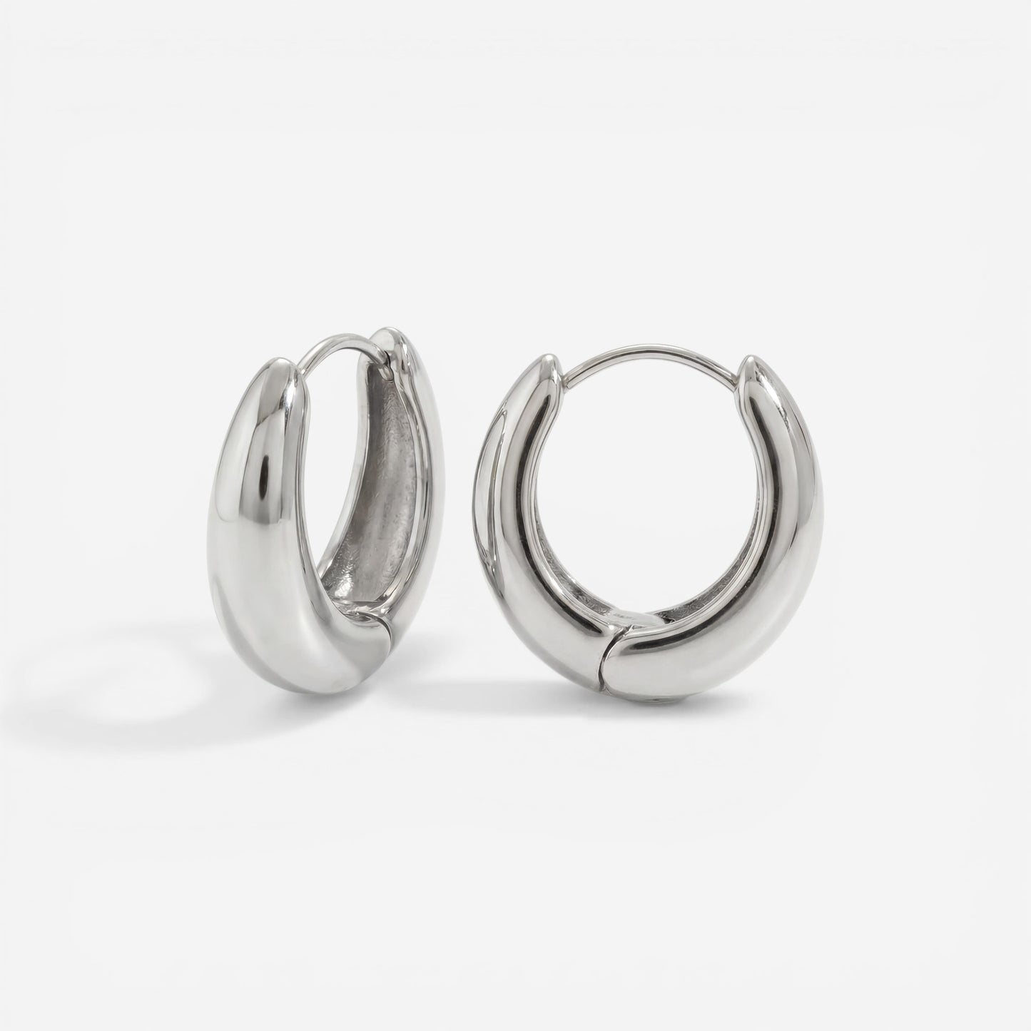 Silver chrome finish teardrop earrings, stainless steel silver chunky hoops, waterproof cool tone jewelry for sensitive ears.