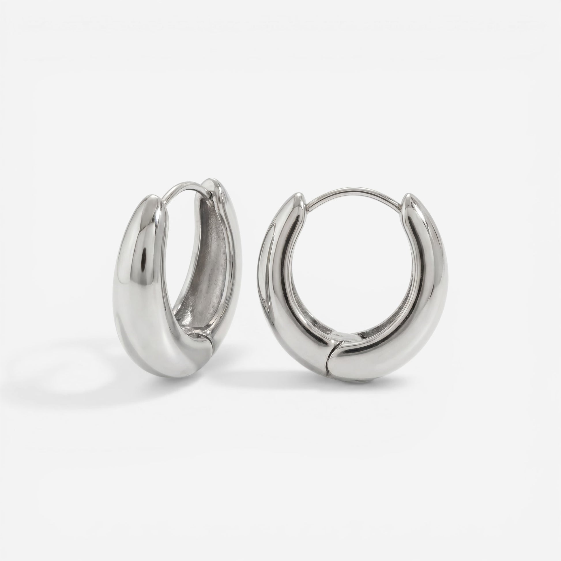 Silver chrome finish teardrop earrings, stainless steel silver chunky hoops, waterproof cool tone jewelry for sensitive ears.