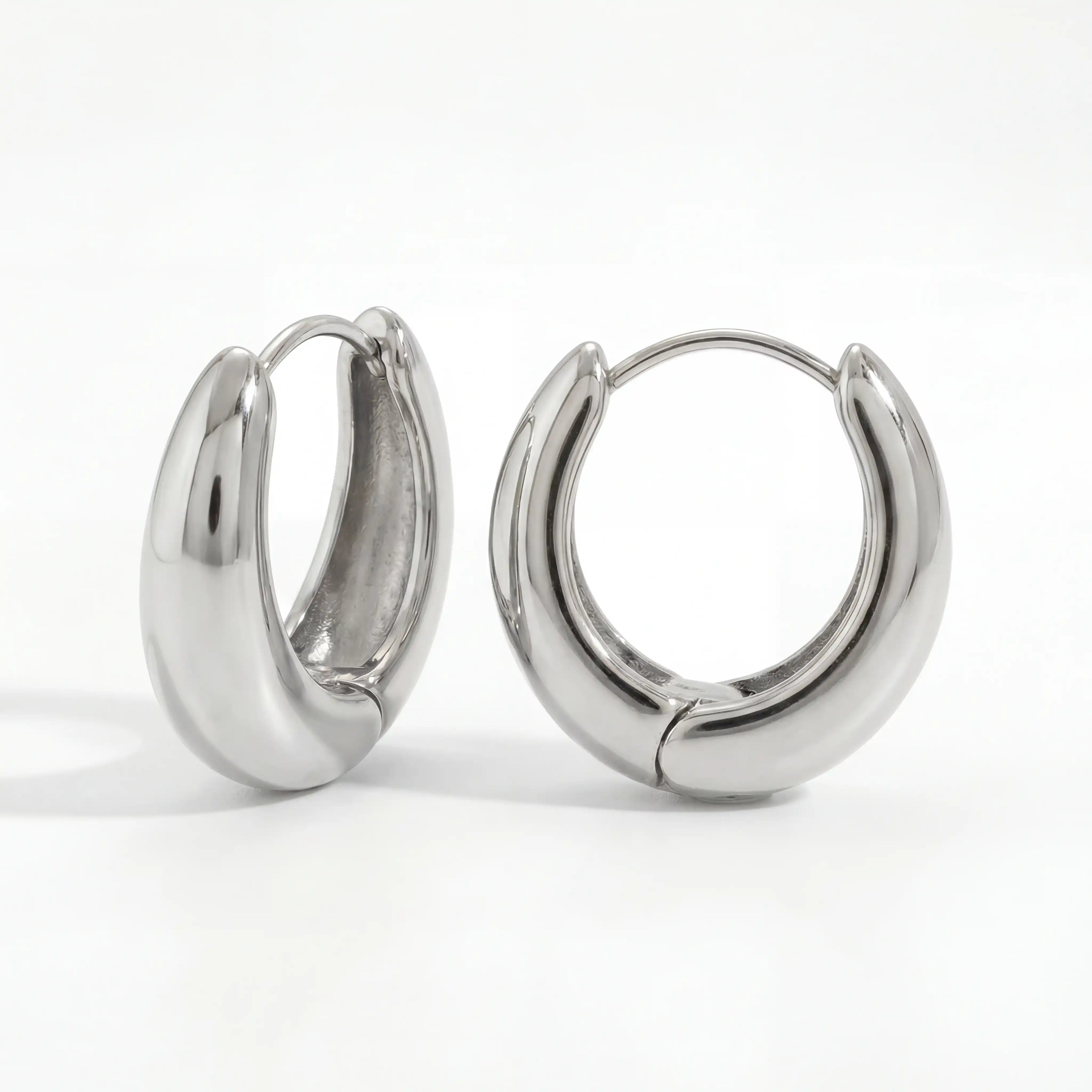 Silver chrome finish teardrop earrings, stainless steel silver chunky hoops, waterproof cool tone jewelry for sensitive ears.