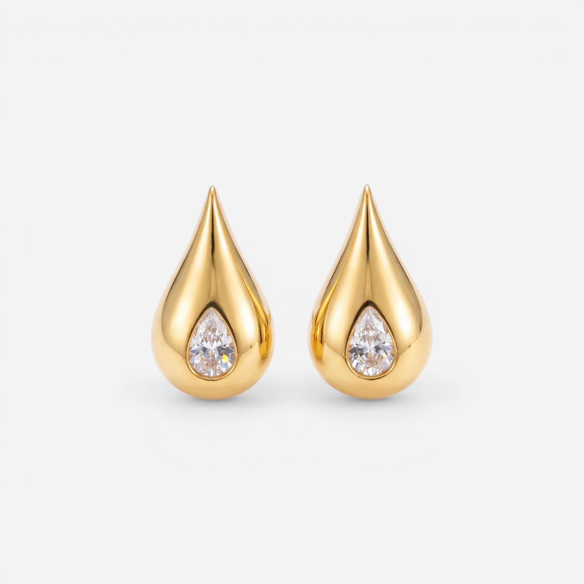 Pair of chunky gold teardrop stud earrings with zircon center waterproof stainless steel.