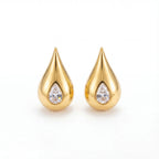Pair of chunky gold teardrop stud earrings with zircon center waterproof stainless steel.