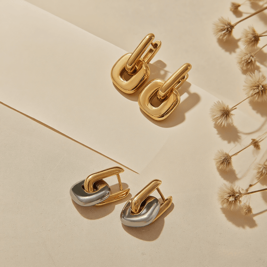 Urban Link Earrings — polished sculptural link earrings in gold / dual-tone, modern and bold design.