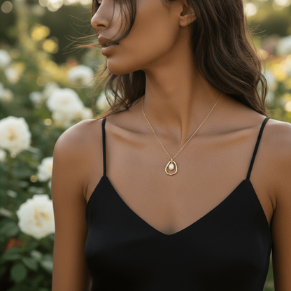A close-up of a model post-workout, wearing The Luna Pearl necklace. The sweat-proof and tarnish-free piece looks flawless against her skin, highlighting its suitability for an active lifestyle.