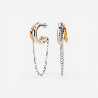 Mixed metal two-tone silver and gold C-hoop earrings with dangling chain drop.