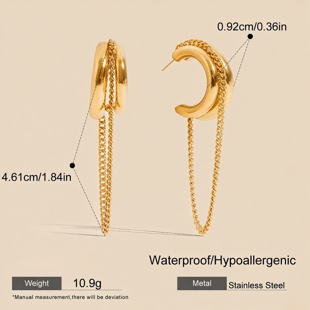 Luxe Layered Chain Hoops in 18K gold featuring a triple-stacked chunky C-shape design with a hanging curb chain on a white background.
