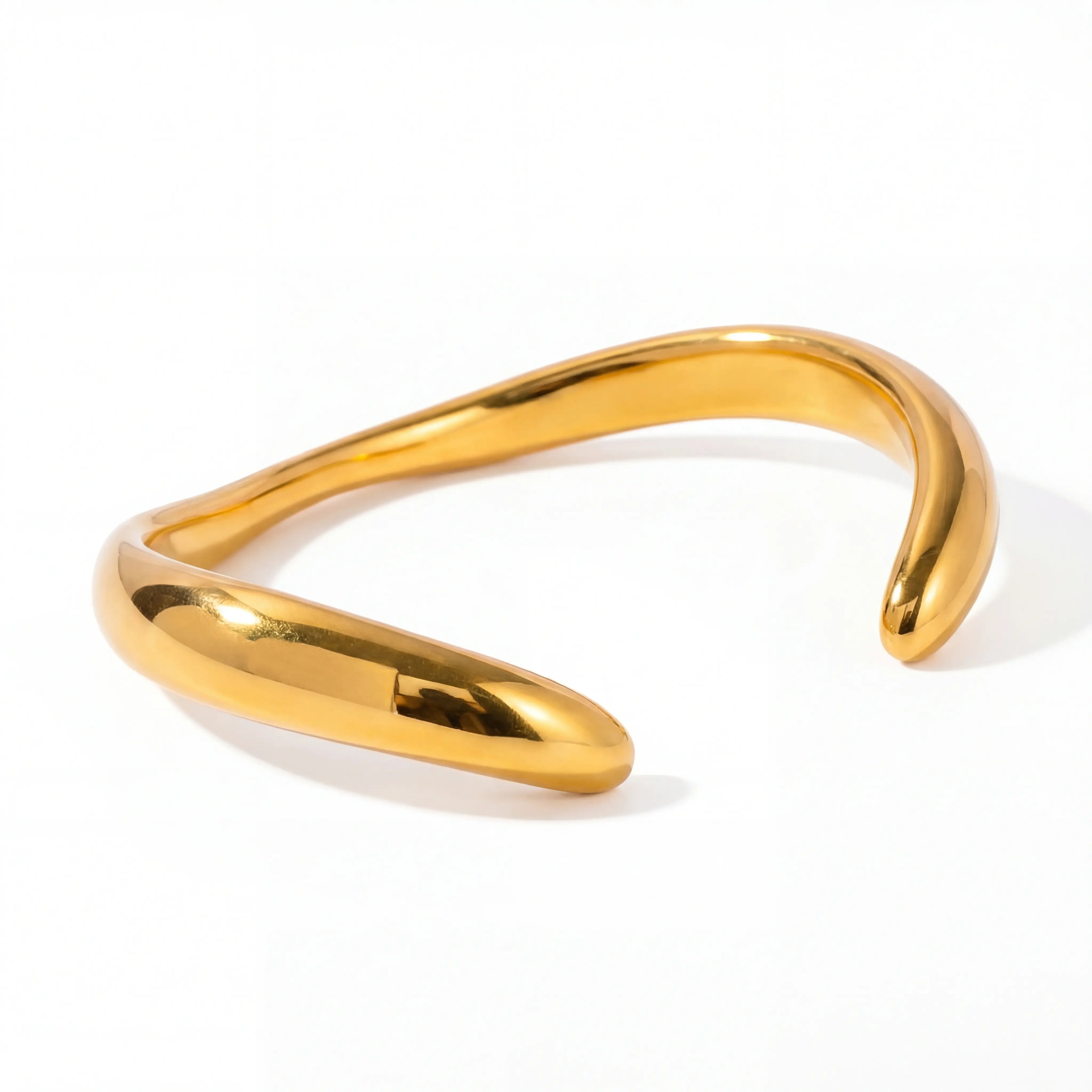 Gold organic wave open cuff bracelet waterproof stainless steel liquid metal design.