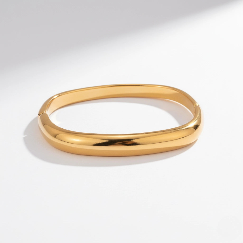 Ergonomic soft square shape gold bangle comfortable fit for wrist.