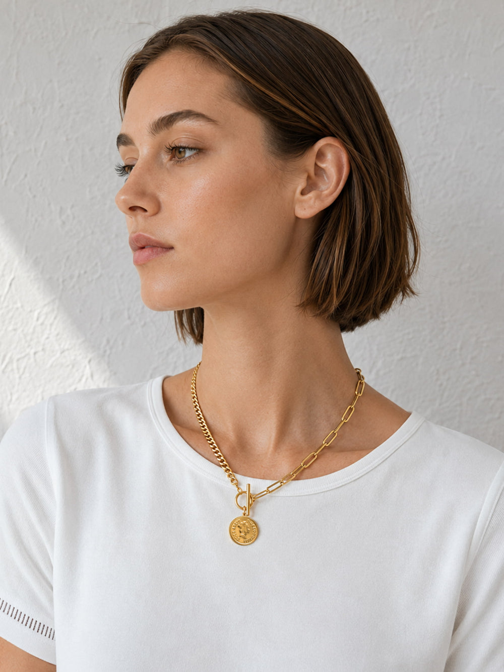 Close-up of Mixed Chain Coin Toggle Necklace with front T-bar clasp and mixed chain design