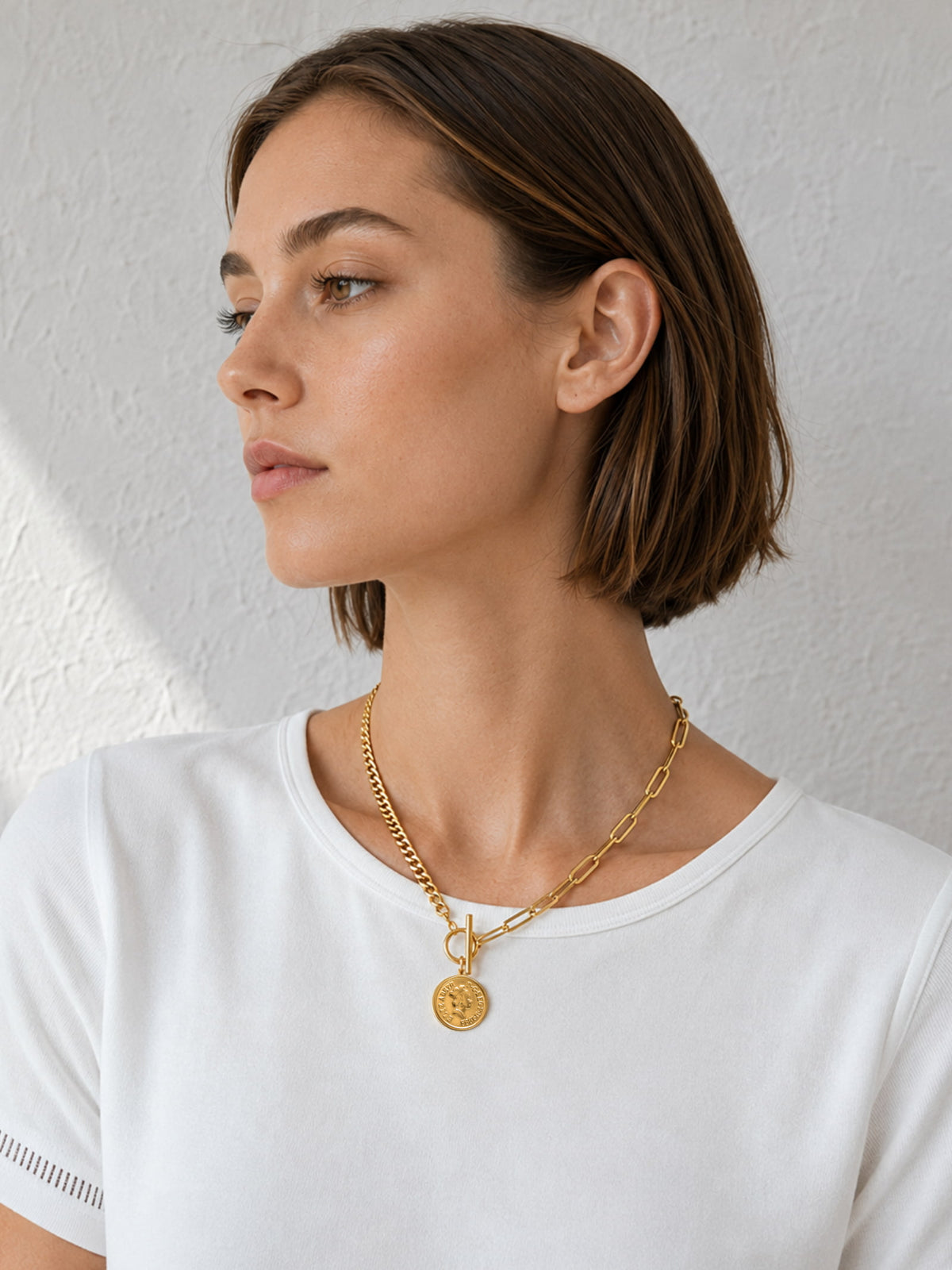 Close-up of Mixed Chain Coin Toggle Necklace with front T-bar clasp and mixed chain design