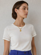 Mixed Chain Coin Toggle Necklace styled with a simple outfit for everyday gold jewelry