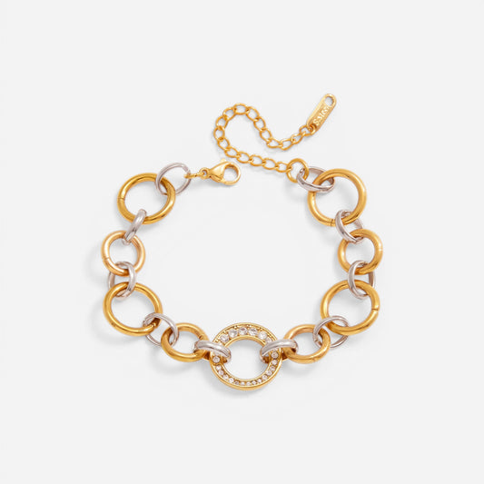 Mixed metal interlocking link bracelet two-tone gold and silver waterproof stainless steel.