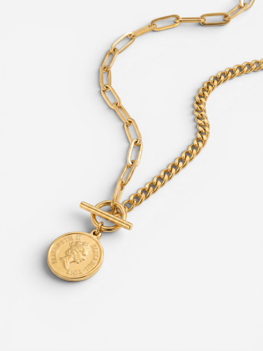 Gold toggle clasp necklace with mixed chain and coin pendant detail