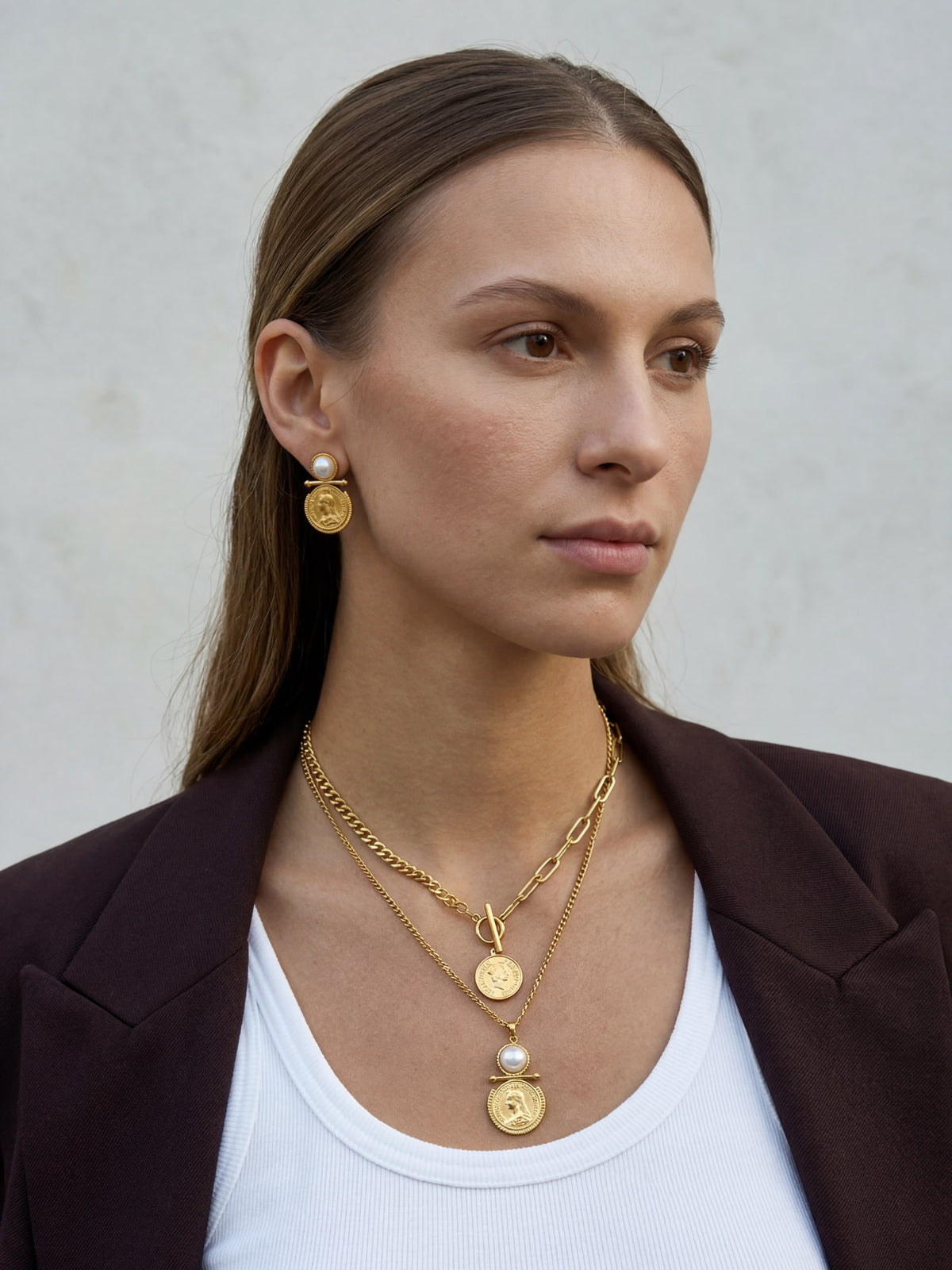 Gold coin pendant necklace styled with blazer and everyday outfit