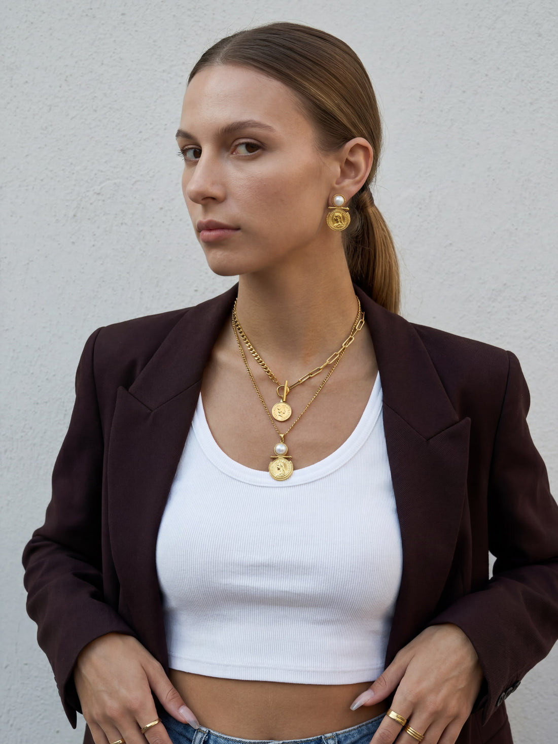 Waterproof gold mixed chain necklace worn by model in lifestyle photo