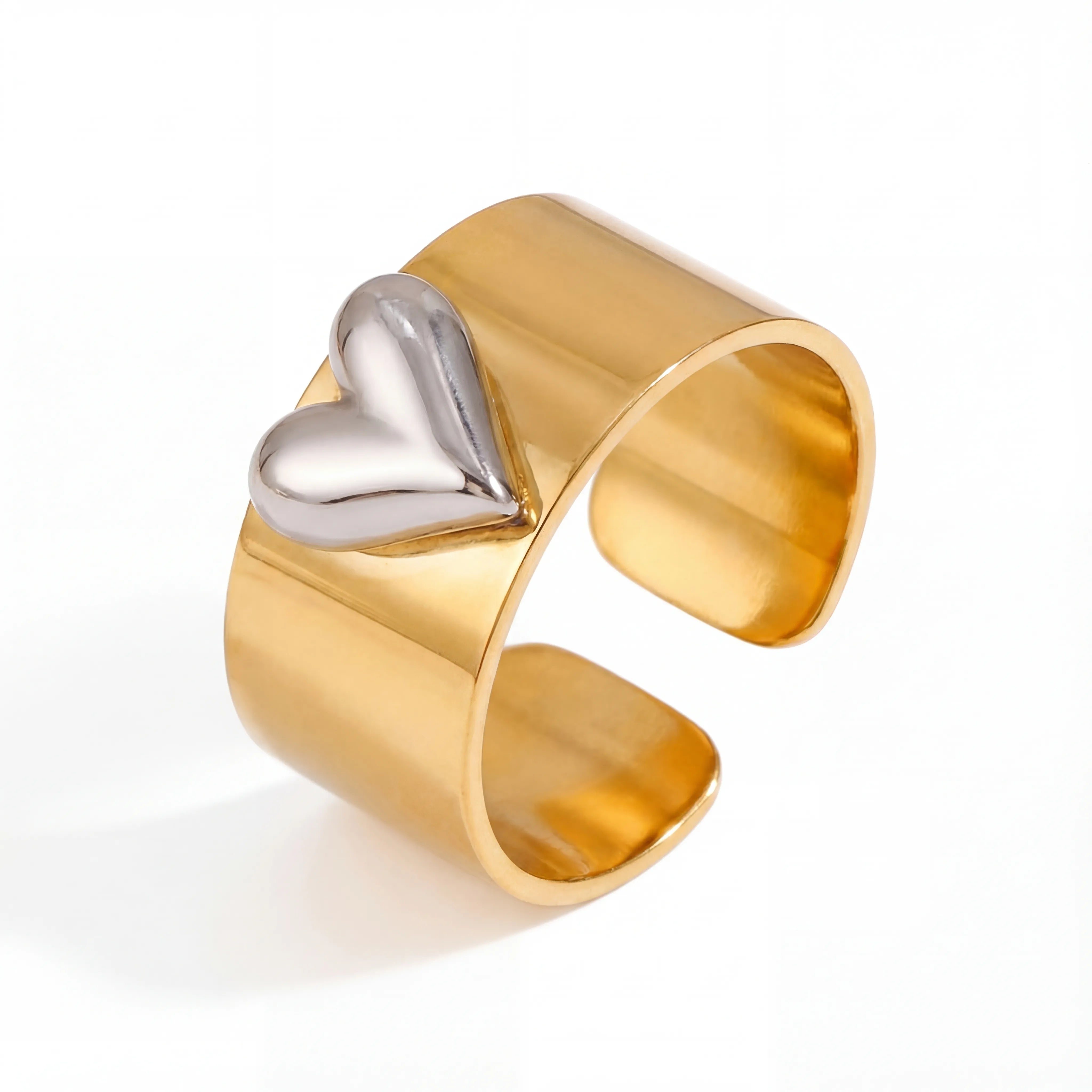 Gold cigar band ring with silver 3D puffed heart mixed metal jewelry.