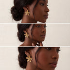 Dark skin model styling sculptural gold flower studs vintage art vibe.