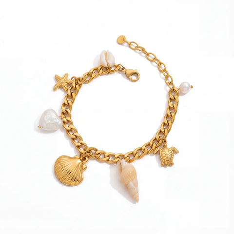 Gold curb chain bracelet with sea shell starfish and pearl charms waterproof jewelry.