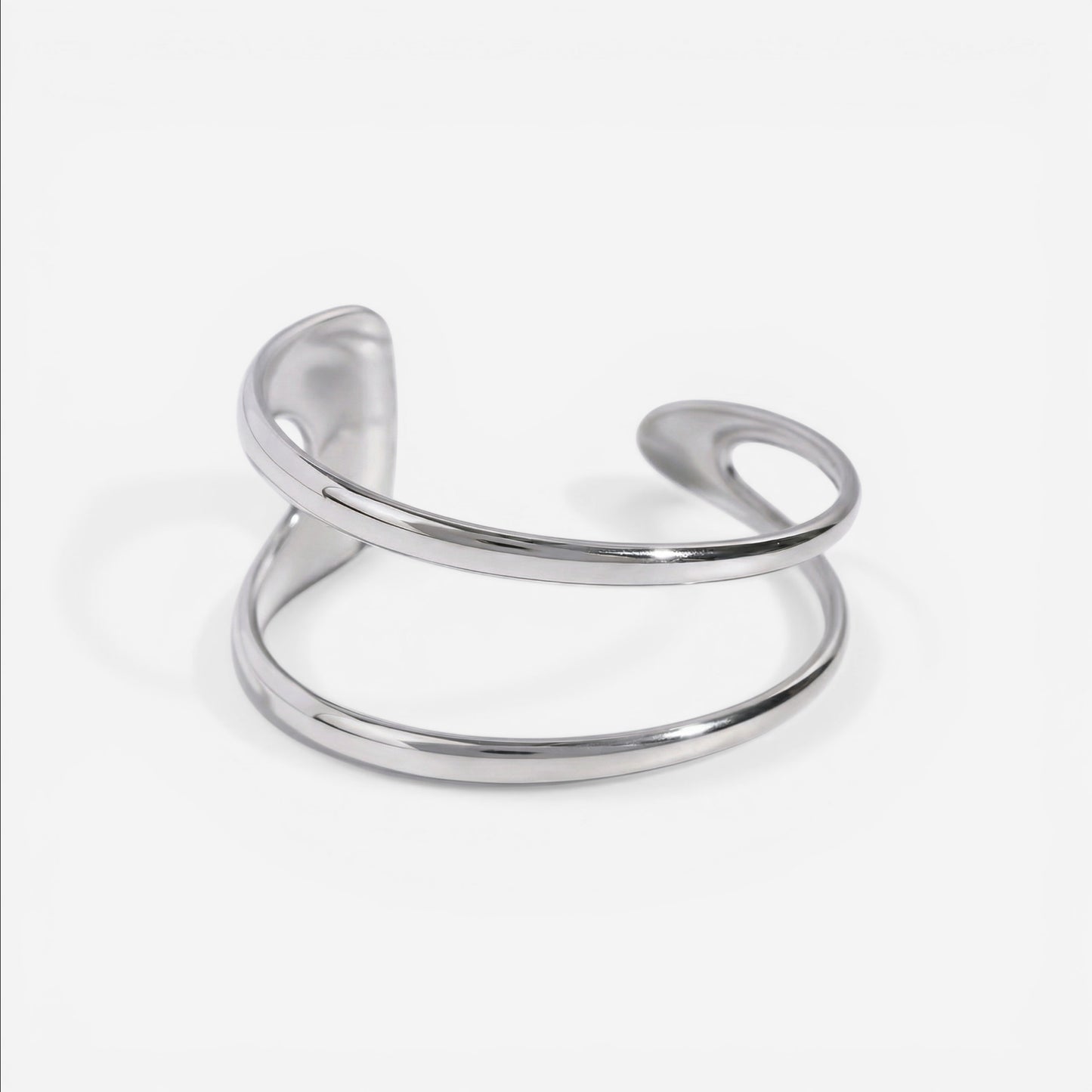 Silver stainless steel geometric open cuff bracelet fluid design waterproof.