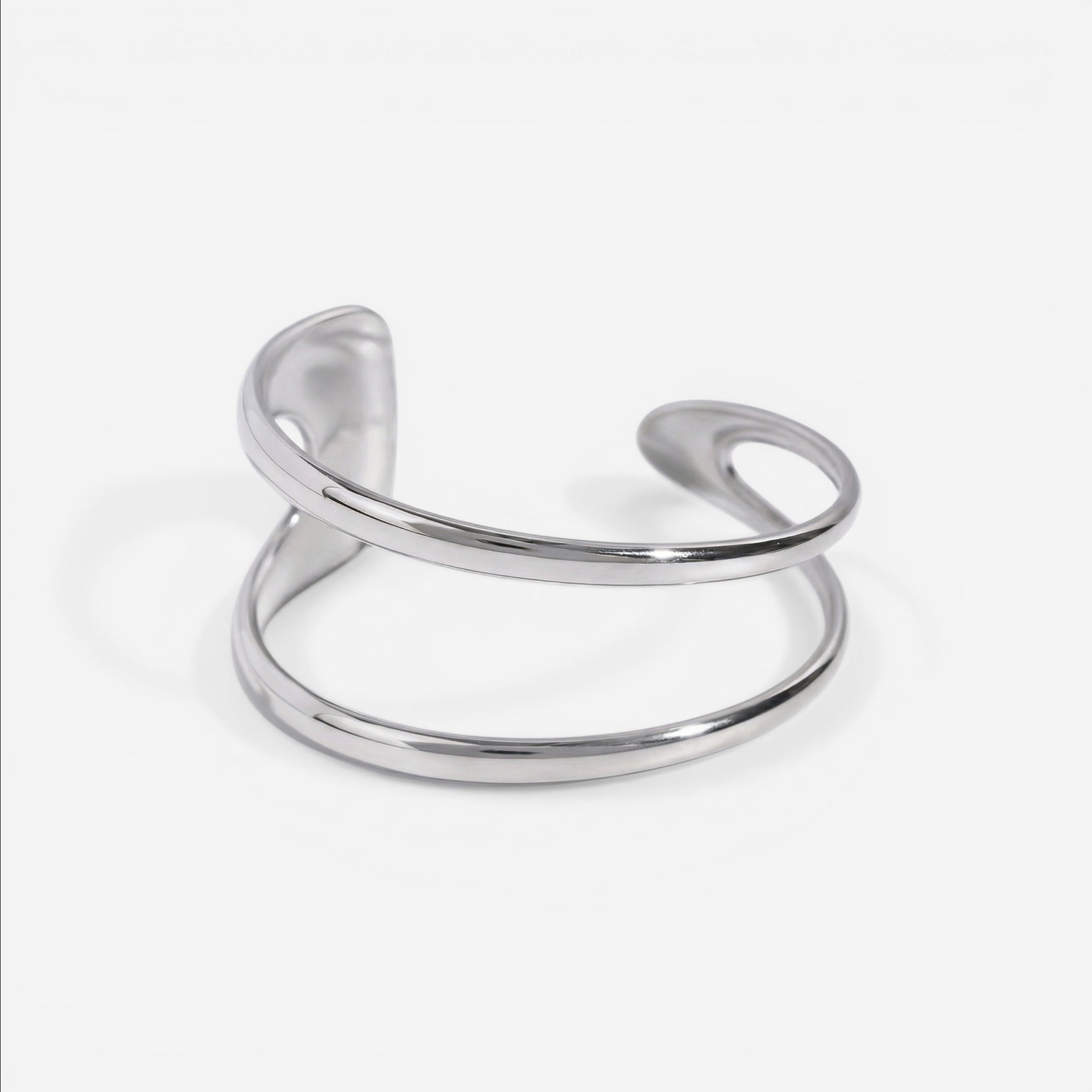 Silver stainless steel geometric open cuff bracelet fluid design waterproof.
