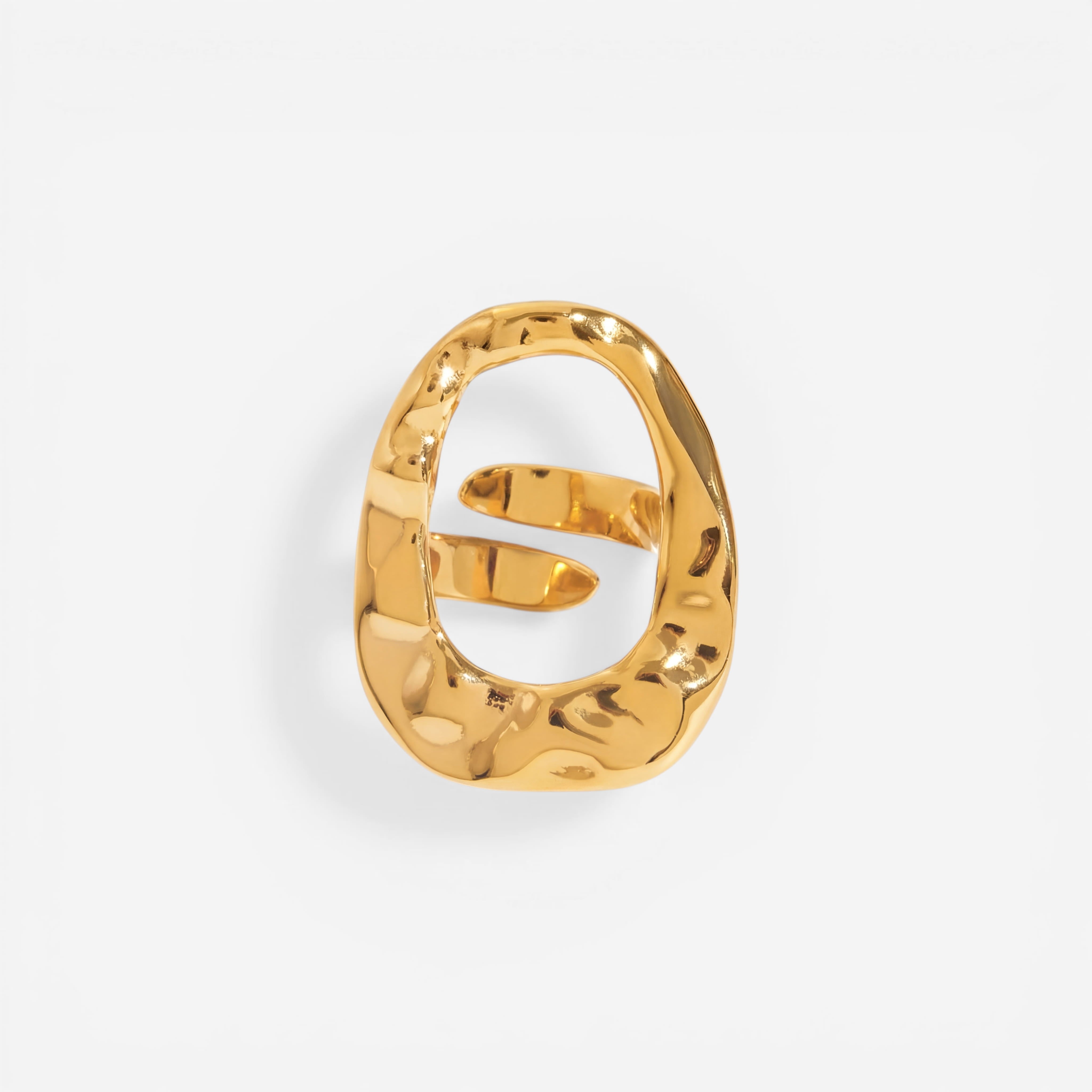Abstract hollow oval statement ring gold hammered texture stainless steel. Main image