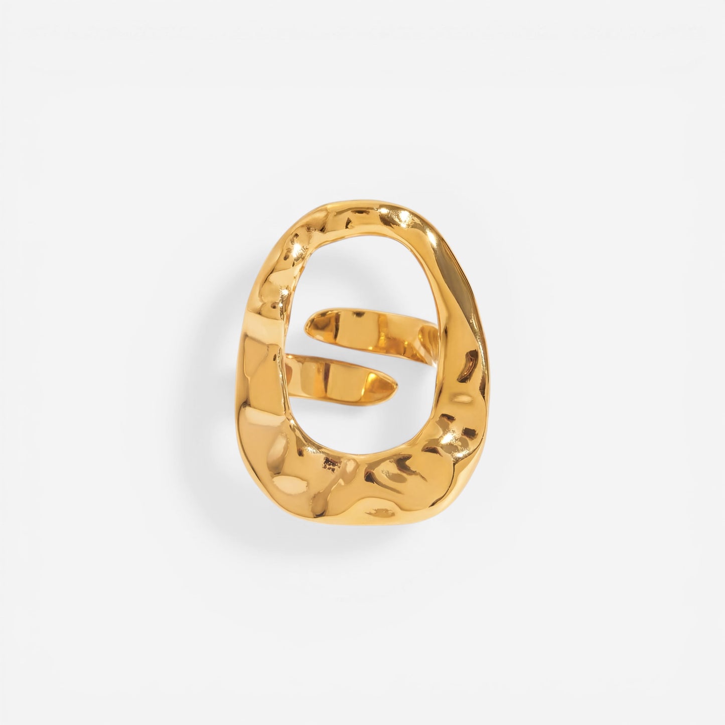 Abstract hollow oval statement ring gold hammered texture stainless steel.
