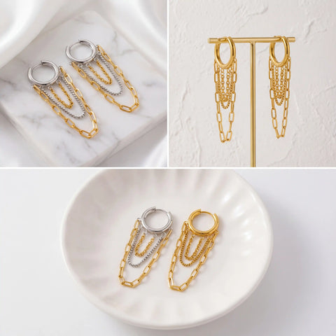 Aesthetic product photography of gold and mixed metal chain fringe earrings.