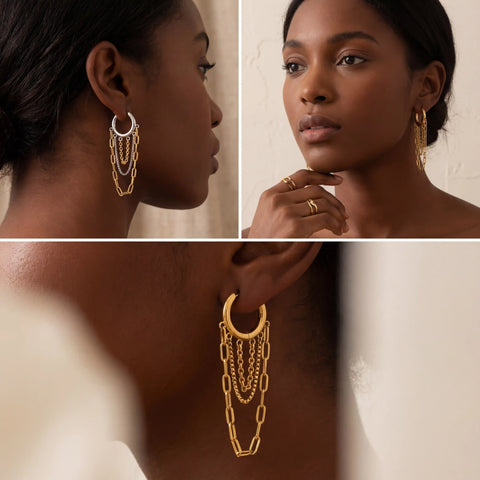 Dark skin model wearing mixed metal chain hoop earrings statement jewelry.