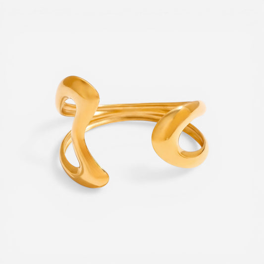 Gold sculptural open cuff bracelet with organic liquid shape waterproof stainless steel.