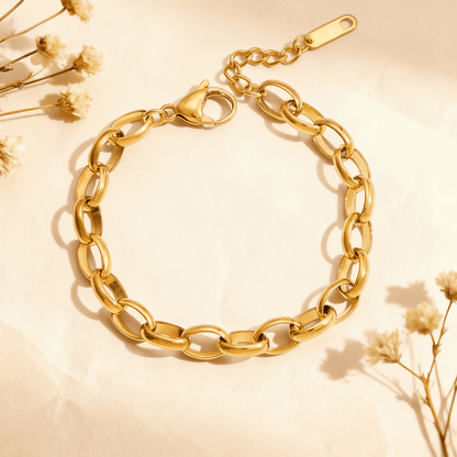 Close-up of the chunky oval-link chain bracelet from The Amalfi Layering Set, showcasing its polished, 18k gold-plated tarnish-free finish.