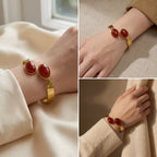 Lifestyle mood board of vintage gold gemstone bracelet styling on wrist.