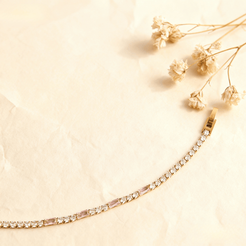 Close-up view of the secure gold box clasp on the Rosé Accent Tennis Bracelet.