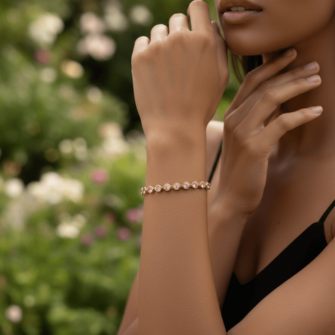 Model wearing the Sweetheart Pink Crystal Tennis Bracelet stacked with a gold watch.