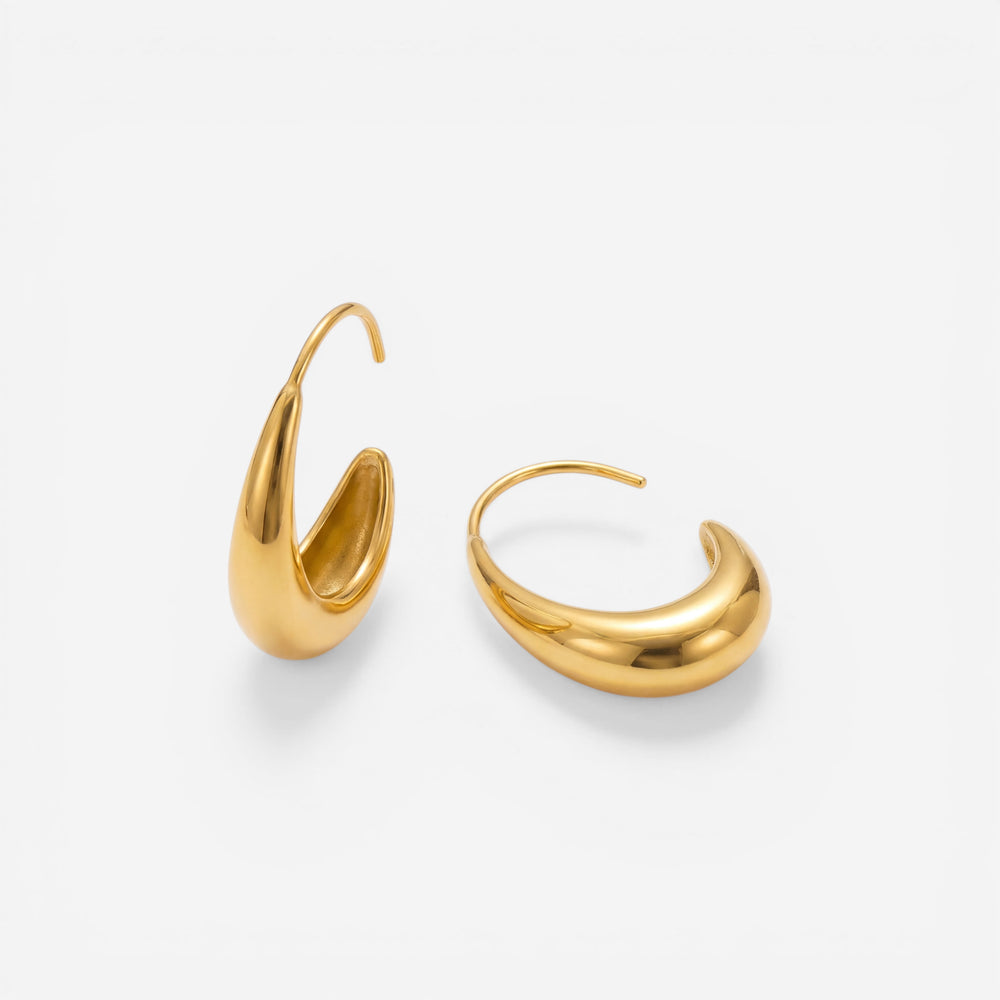 Pair of gold waterdrop hoop earrings waterproof stainless steel hollow design.