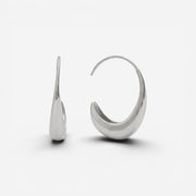 Silver teardrop earrings high polish stainless steel open hoop side view.