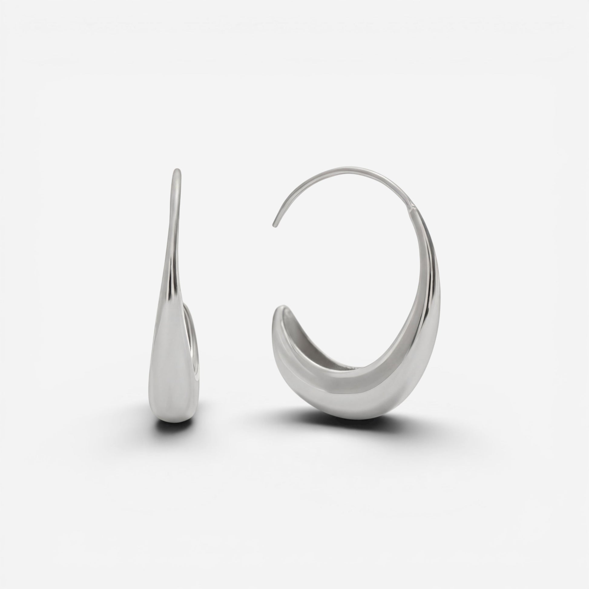 Silver teardrop earrings high polish stainless steel open hoop side view.