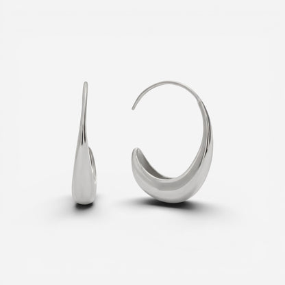 Silver teardrop earrings high polish stainless steel open hoop side view.