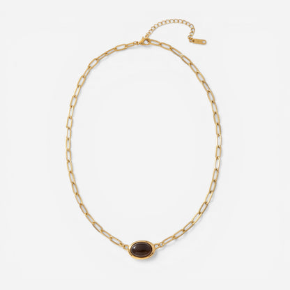 Gold oval link chain necklace with vintage dark stone pendant waterproof stainless steel.