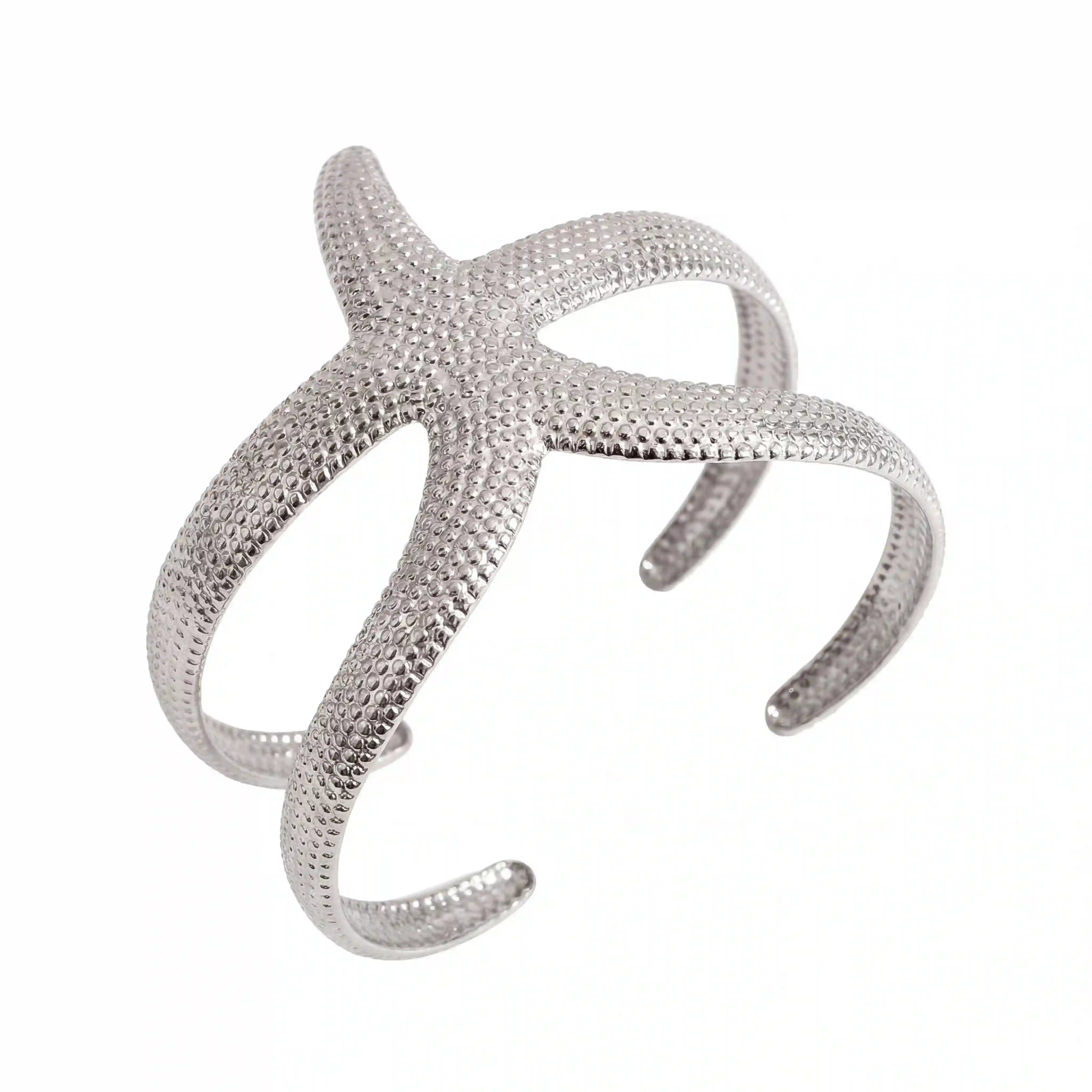 Silver stainless steel starfish bangle bracelet mermaidcore ocean jewelry.