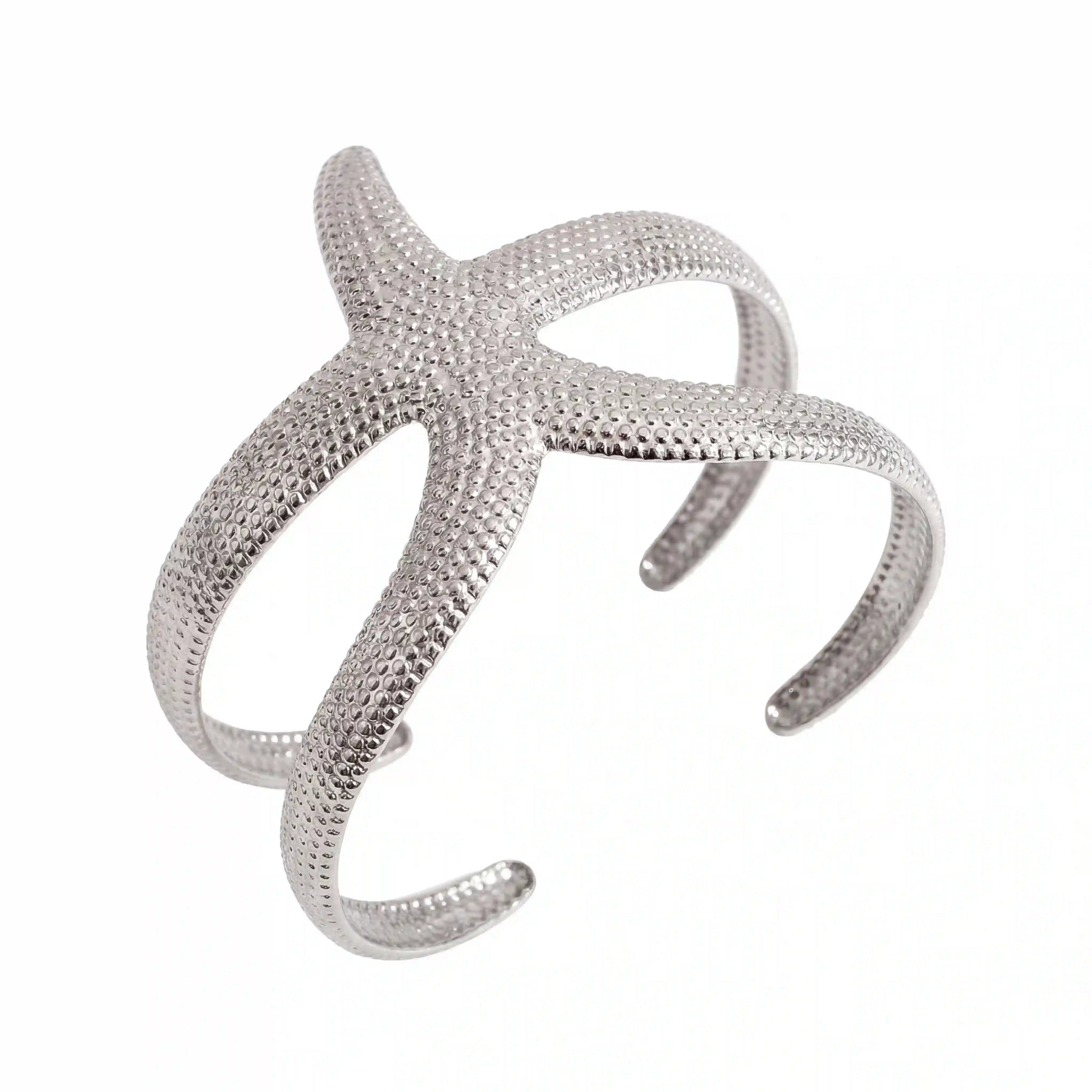 Silver stainless steel starfish bangle bracelet mermaidcore ocean jewelry.