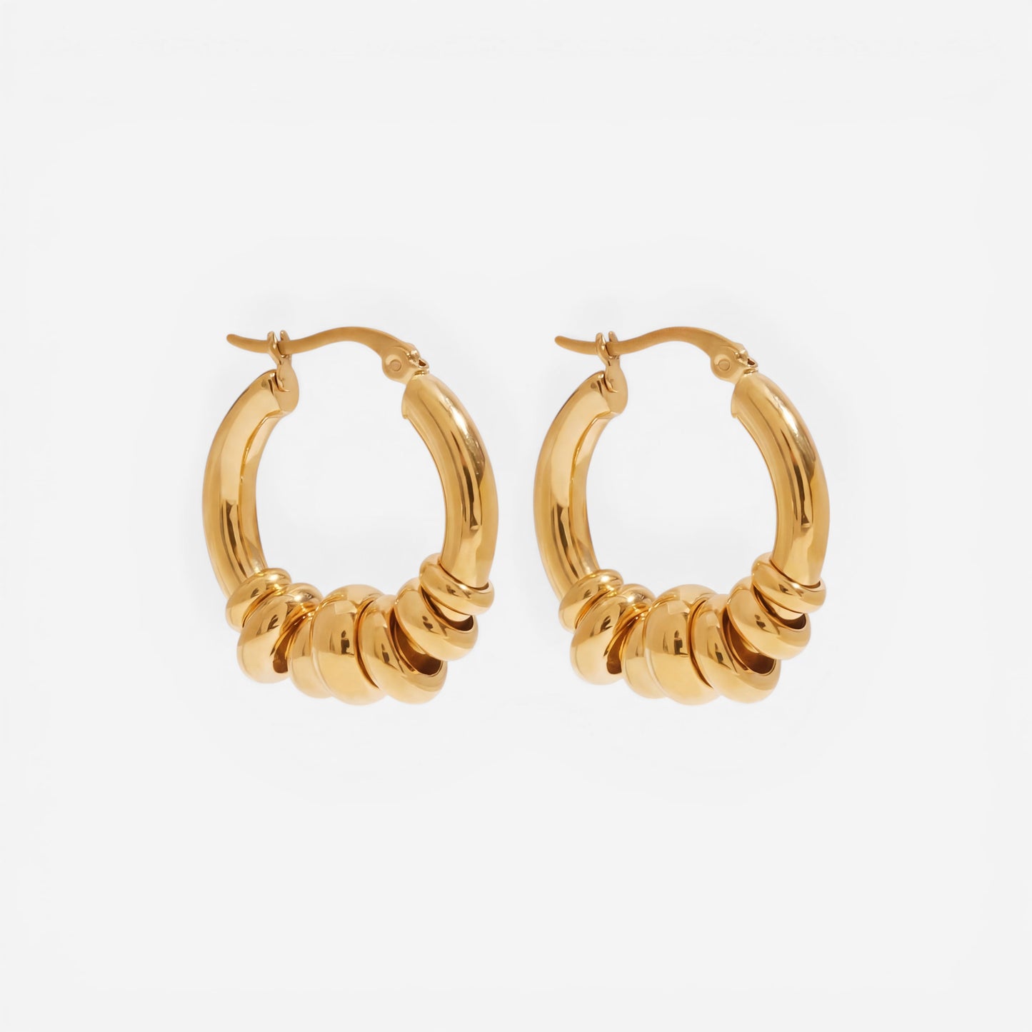 Solid gold stacked ring hoop earrings stainless steel chunky design.