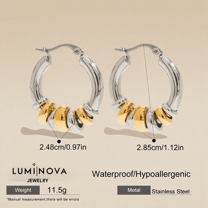 A pair of two tone Siena Stacked Hoops, highlighting the textural, multi-ring design and high-shine 18K gold-painted and polished finish.