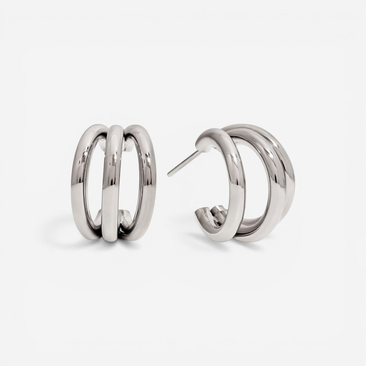 Silver triple layer illusion hoops polished stainless steel stack earrings for women.