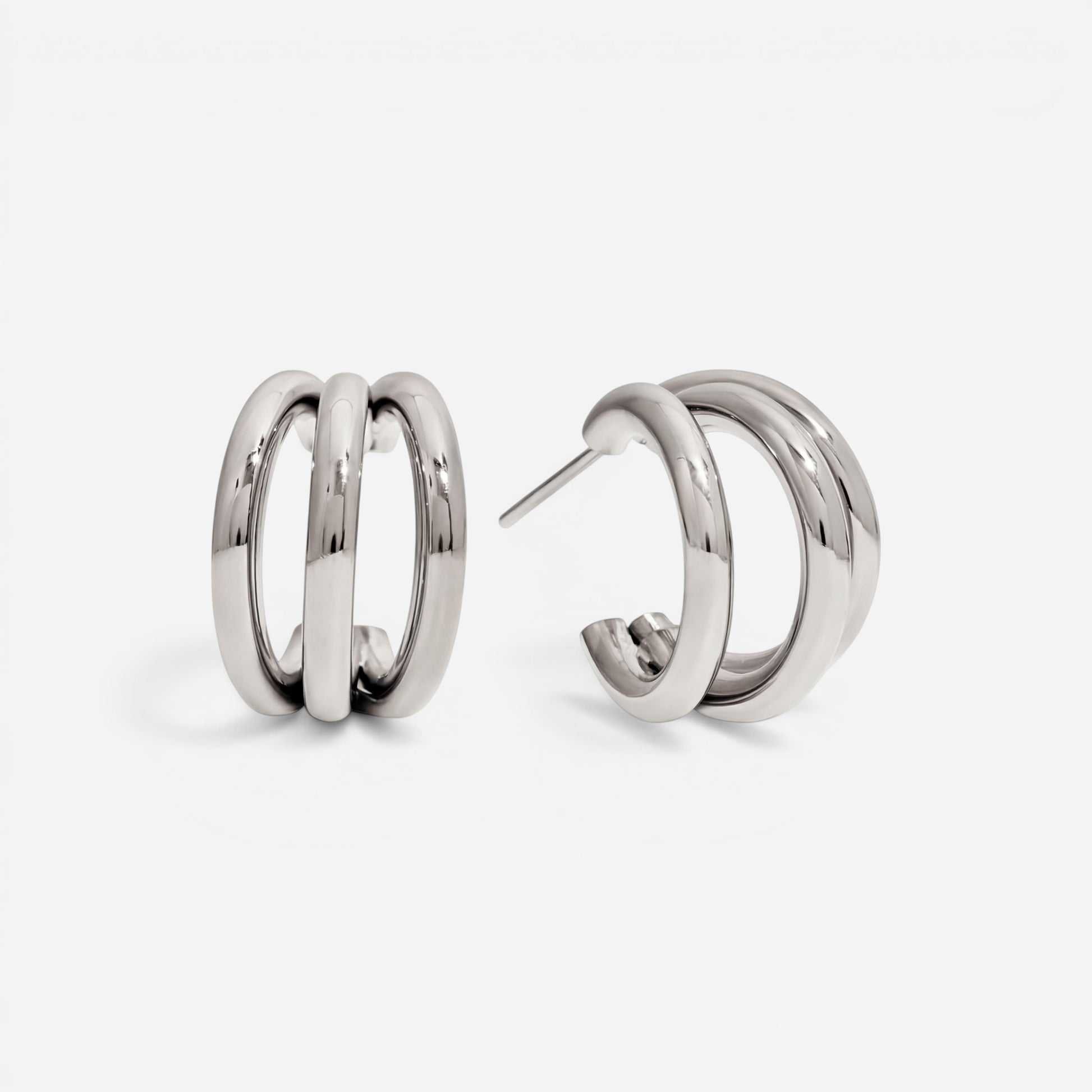 Silver triple layer illusion hoops polished stainless steel stack earrings for women.