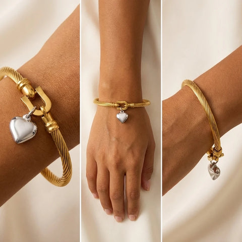 Lifestyle mood board of woman wearing mixed metal heart bangle summer fashion.