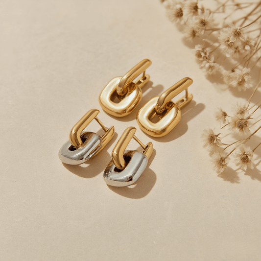 Urban Link Earrings — polished sculptural link earrings in gold / dual-tone, modern and bold design.