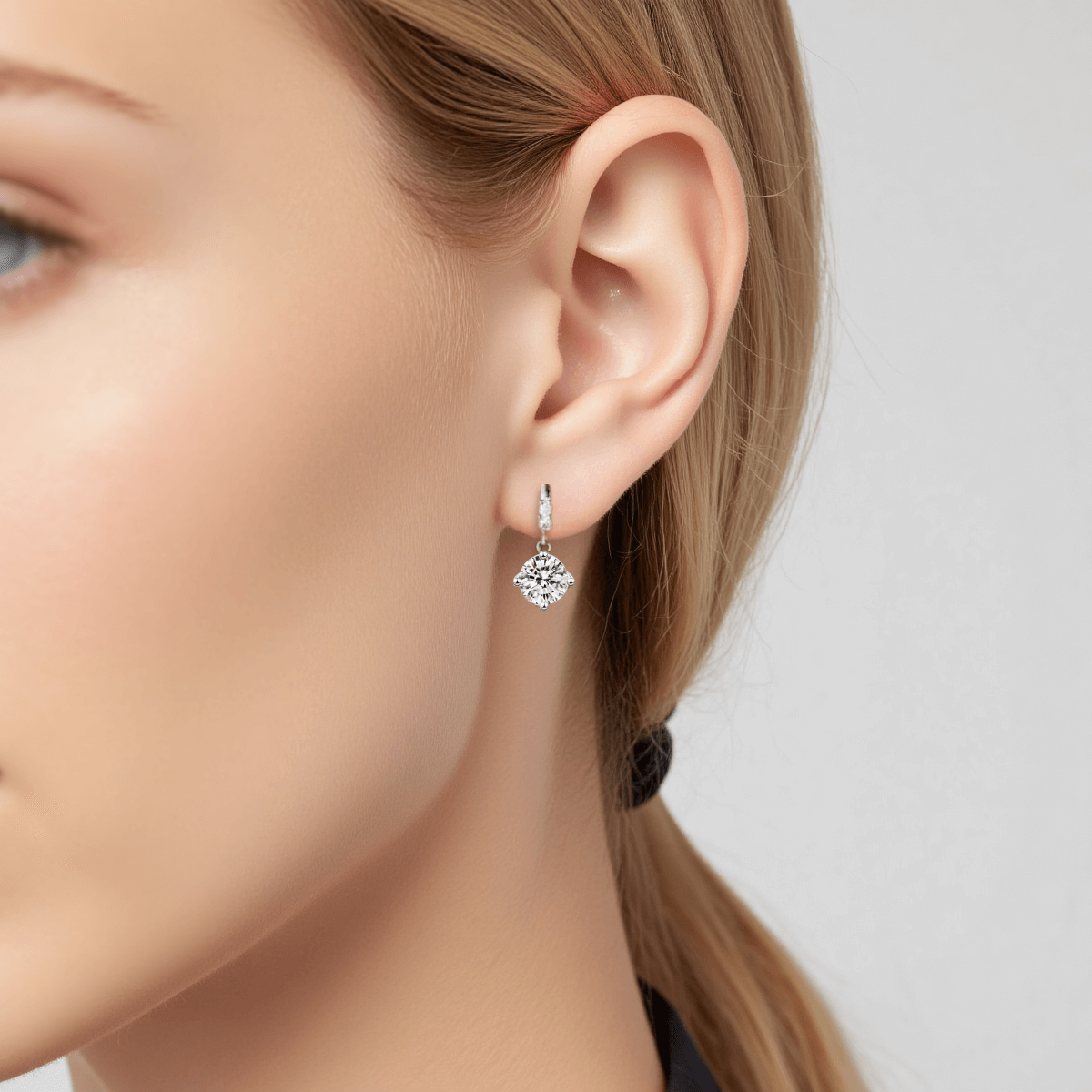 Fairy Drop Moissanite Earrings — delicate dangle earrings with sparkling moissanite drops, capturing ethereal everyday magic.