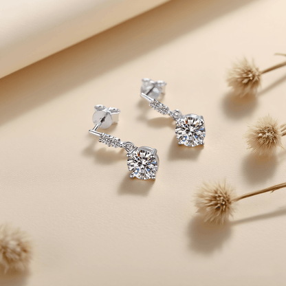 Fairy Drop Moissanite Earrings — delicate dangle earrings with sparkling moissanite drops, capturing ethereal everyday magic.