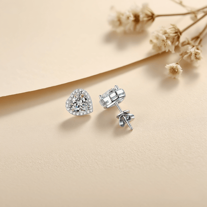 Gleaming Heart Moissanite Earrings — sterling silver heart-shaped stud earrings with sparkling moissanite, romantic and elegant gift.