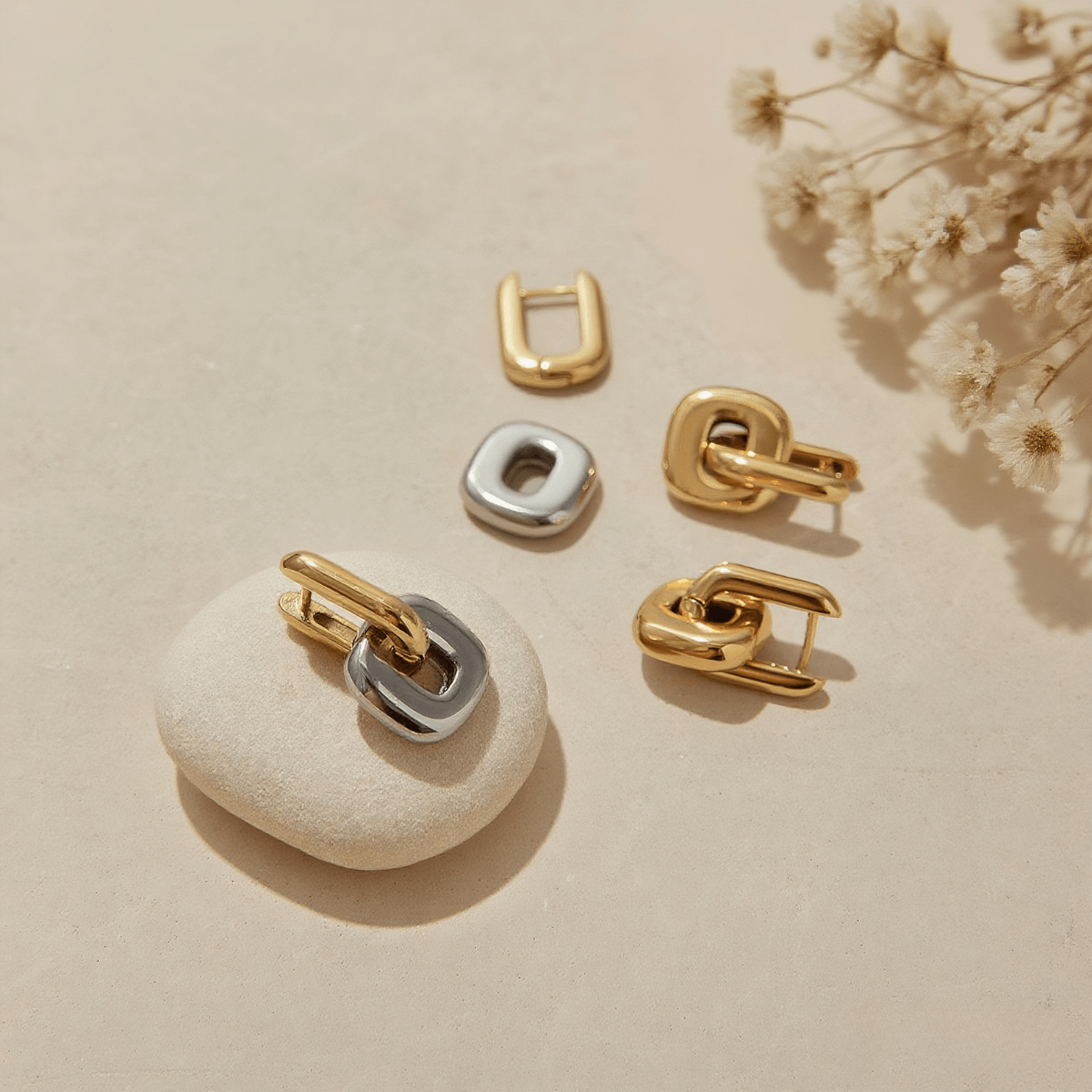 Urban Link Earrings — polished sculptural link earrings in gold / dual-tone, modern and bold design.
